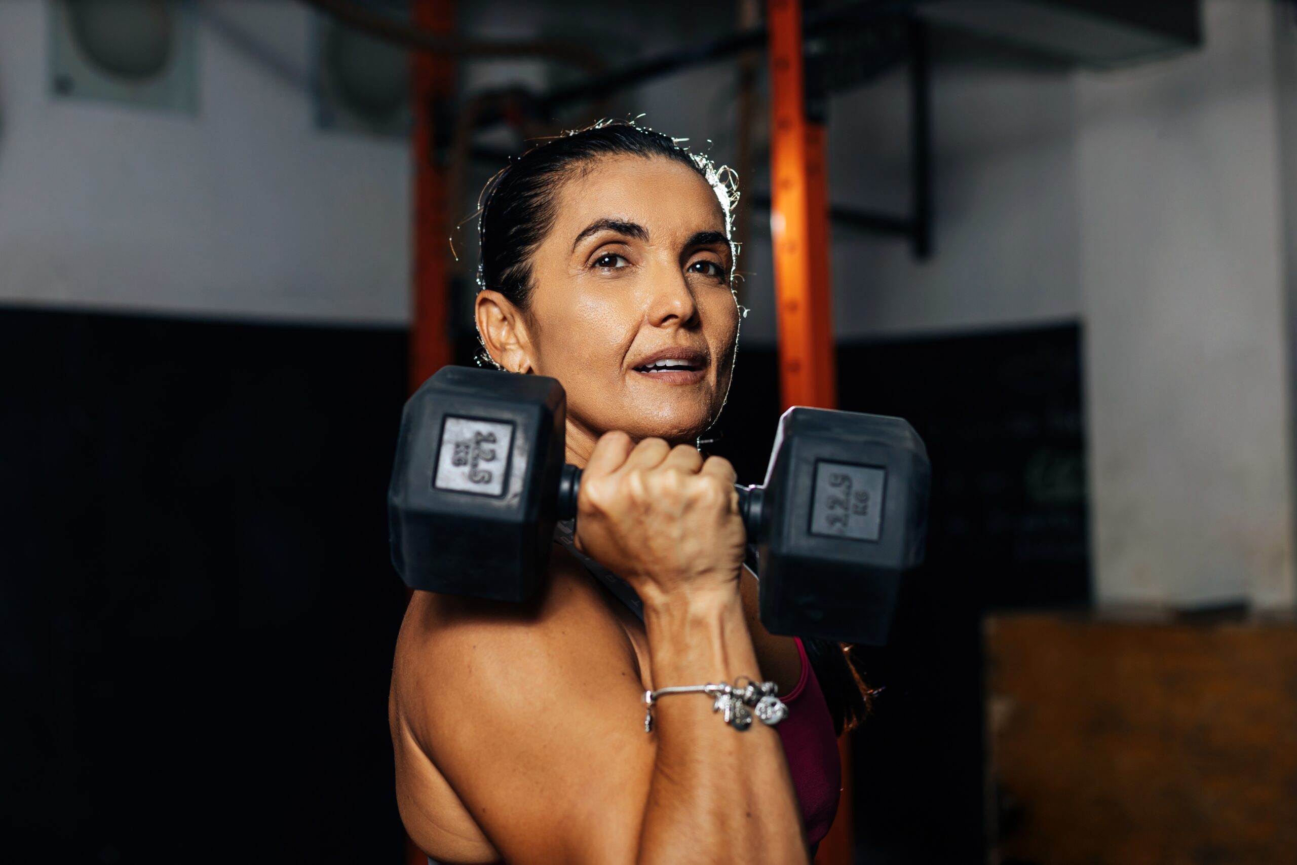 Fitness,Determined,Mature,Woman,Working,Out,At,The,Gym.,Concetrate